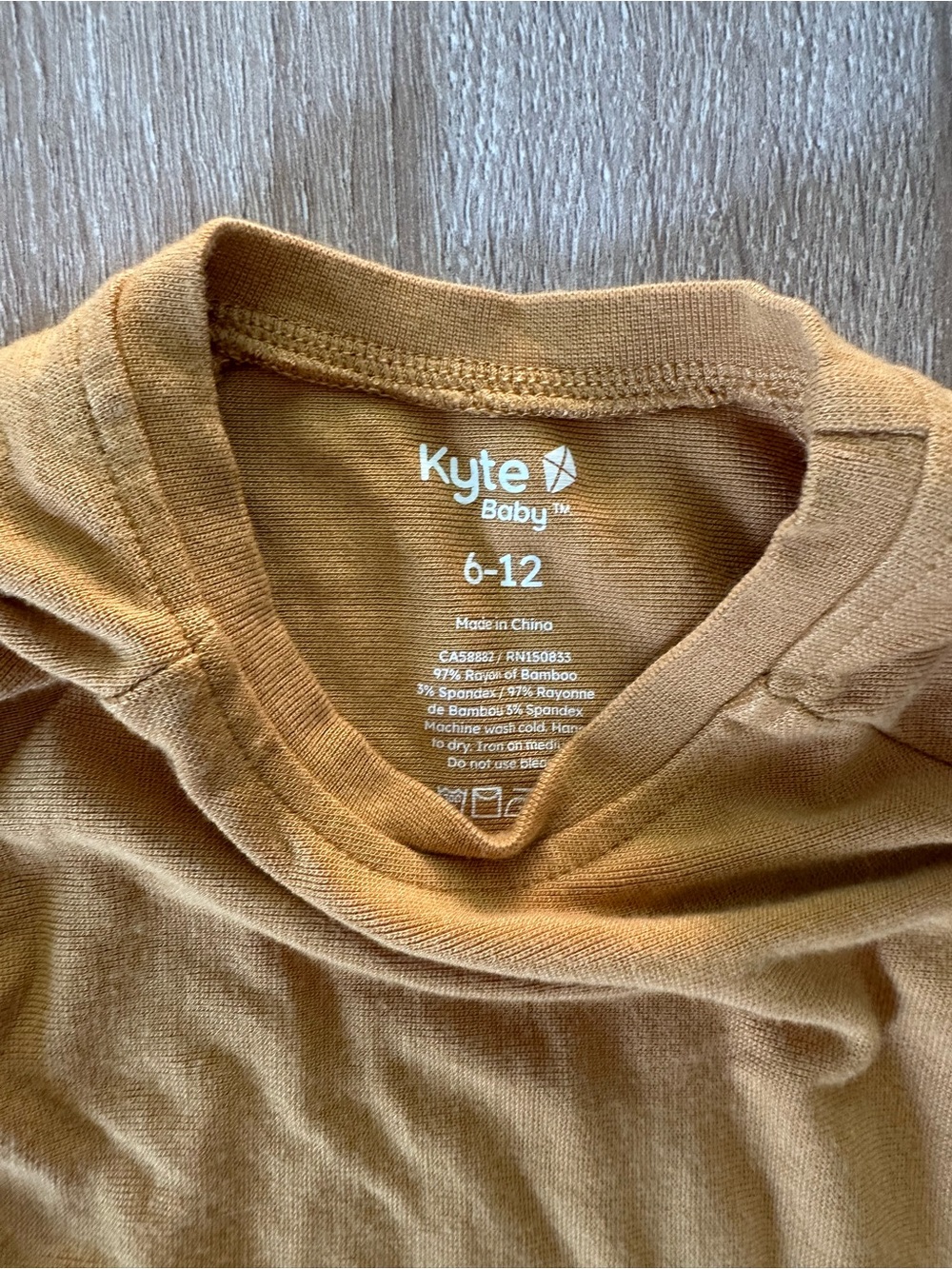 Kyte Baby Mustard yellow long sleeve shirt size 6-12 month